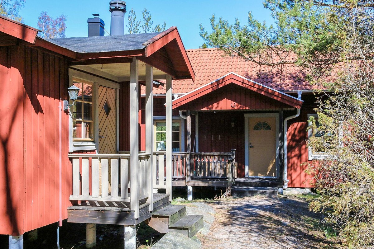 Bastuhus och huvudbyggnad