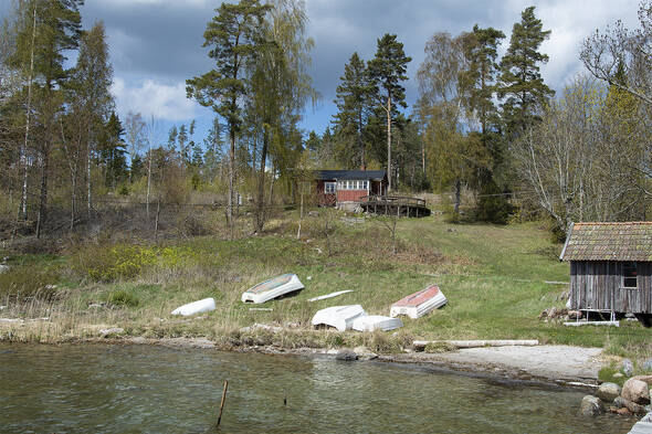 Stranden nedanför huset