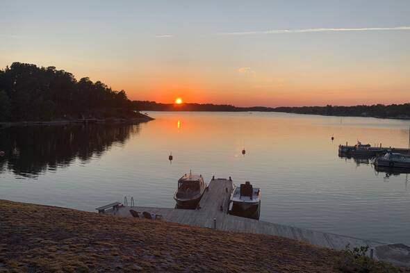 Solnedgång över viken