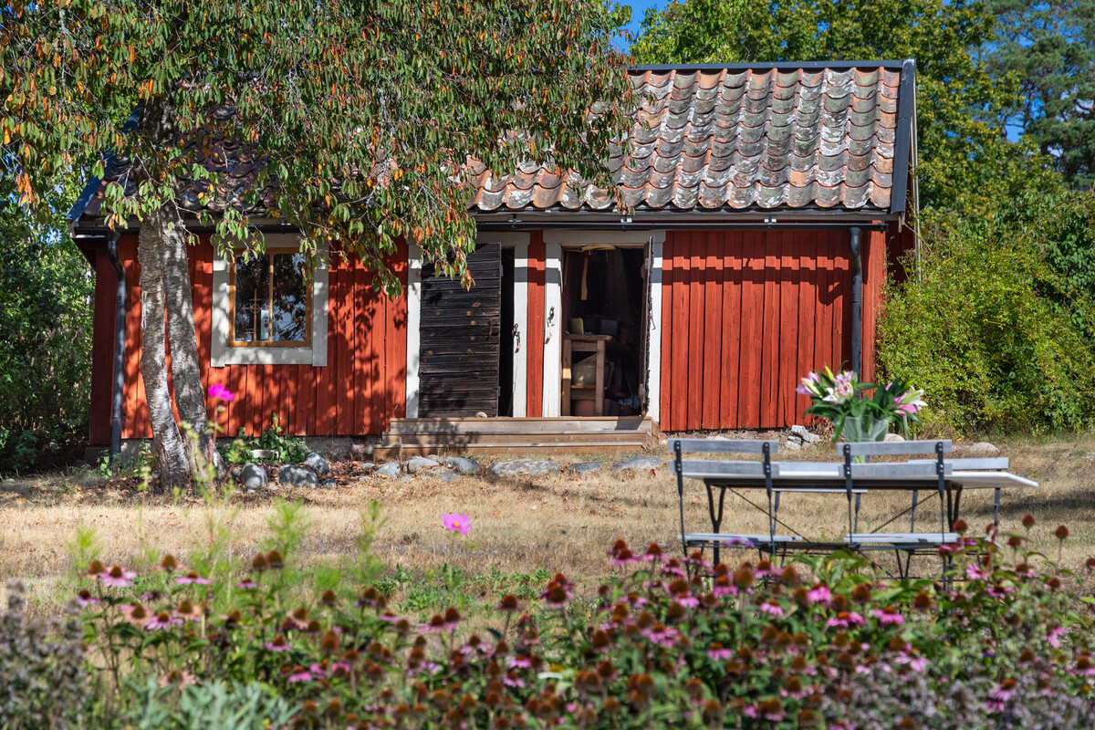 Vedbod och förråd